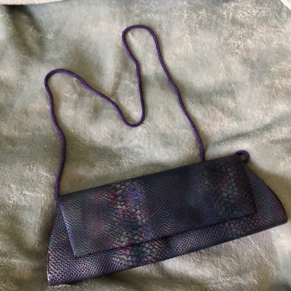 Iridescent snakeskin clutch